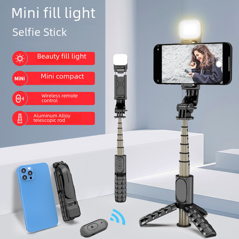 Manufacturer mini selfie stick Bluetooth tripod led fill light selfie stick Beauty Live and photo bracket