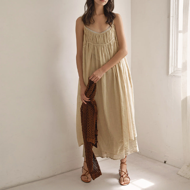 French strap dress 2025 Spring New lazy wind pleated niche design backless long dress women's clothing