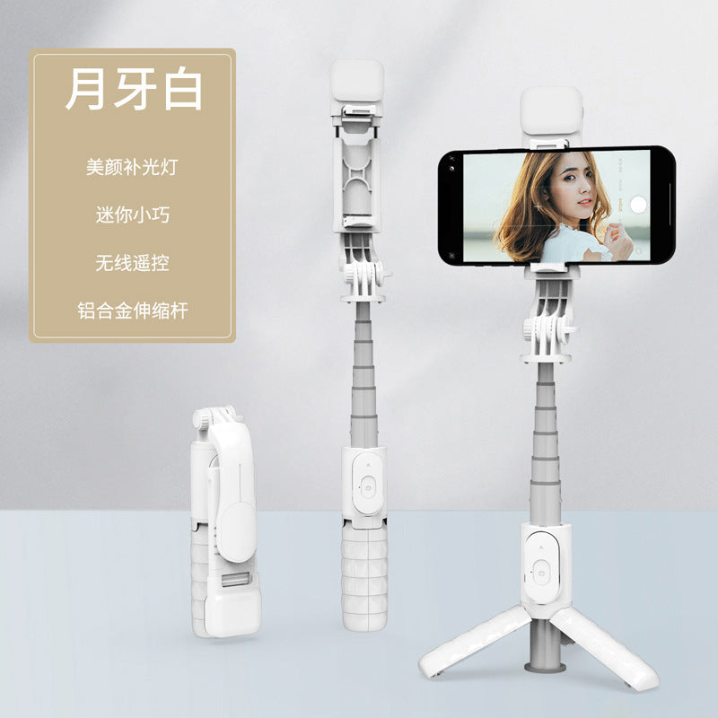 Manufacturer mini selfie stick Bluetooth tripod led fill light selfie stick Beauty Live and photo bracket
